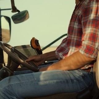 Farmer in combine