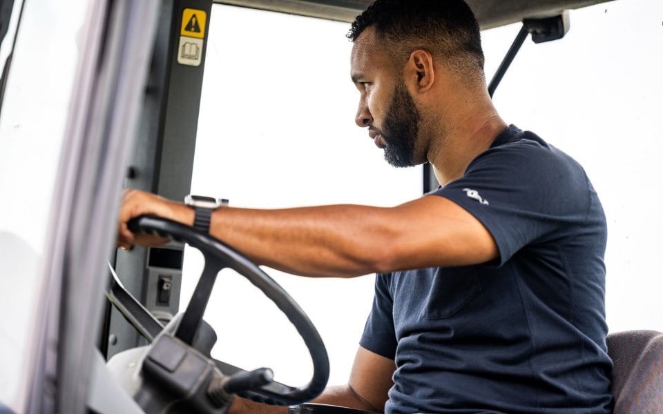 Man driving tractor