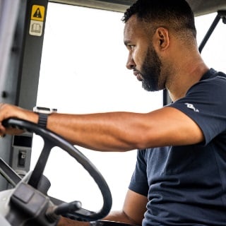 Man driving tractor